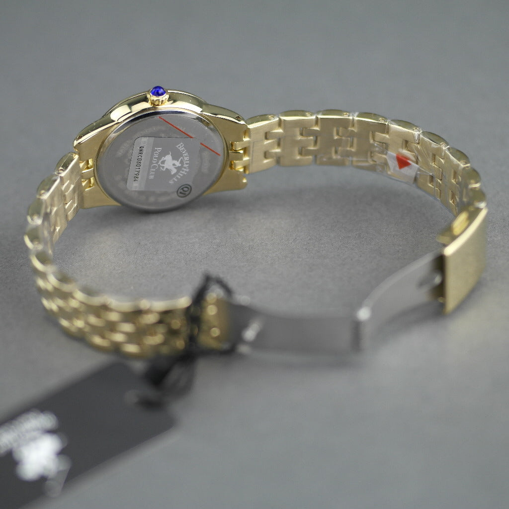 Beverly Hills Polo Club gold plated wristwatch with Roman numerals and blue hands