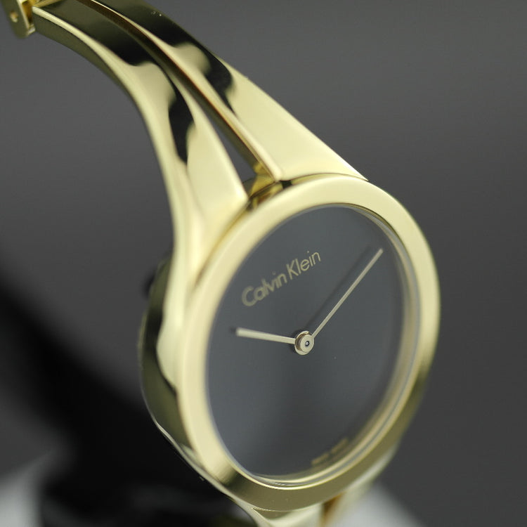Calvin Klein Addict Reloj para mujer con brazalete chapado en oro y esfera negra 