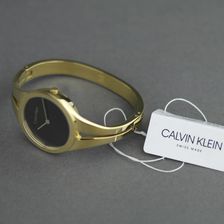 Calvin Klein Addict Reloj para mujer con brazalete chapado en oro y esfera negra 