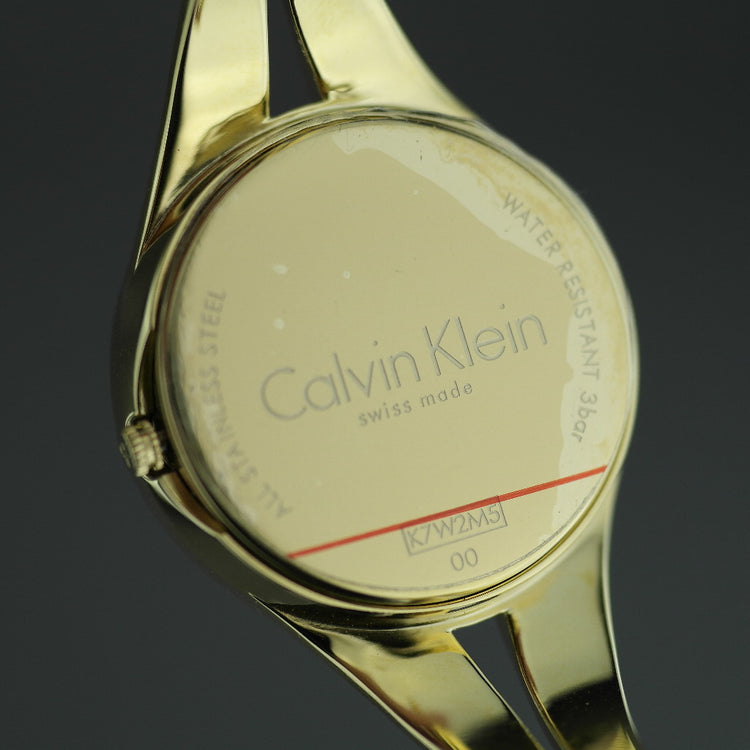 Calvin Klein Addict Reloj para mujer con brazalete chapado en oro y esfera negra 