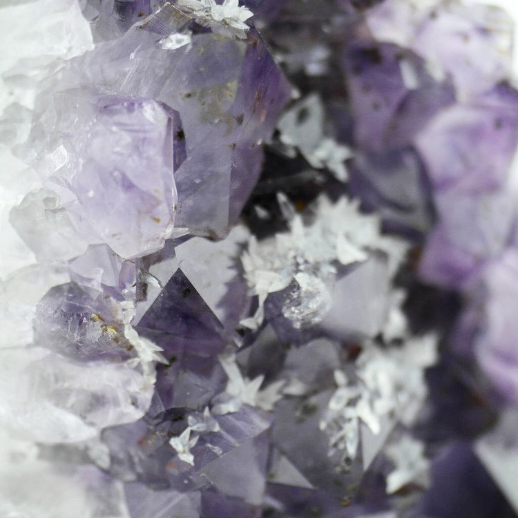 Large raw Amethyst Cluster statue on a Metal Stand