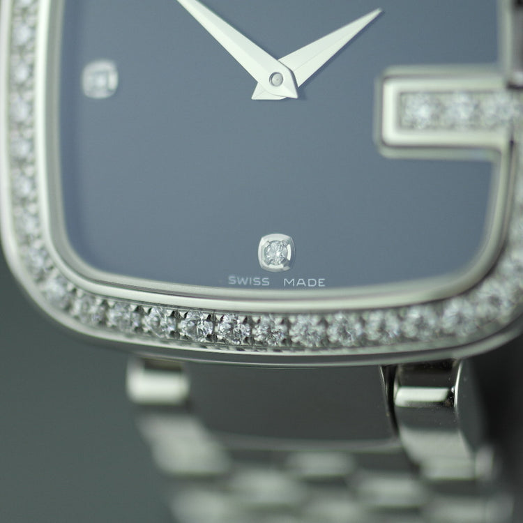 Elegante reloj de pulsera Gucci para mujer con bisel G con incrustaciones de diamantes de 1,01 ct
