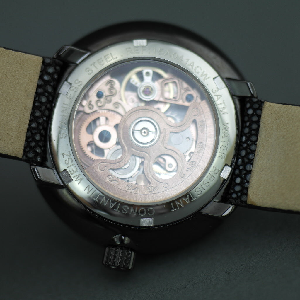 Constantin Weisz Skeleton Automatik-Armbanduhr mit rosafarbener Lünette