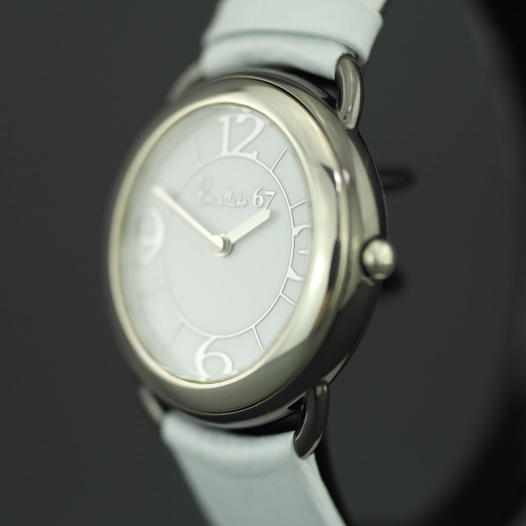 Reloj suizo Pomellato 67 de edición limitada para mujer con números arábigos y correa de piel 