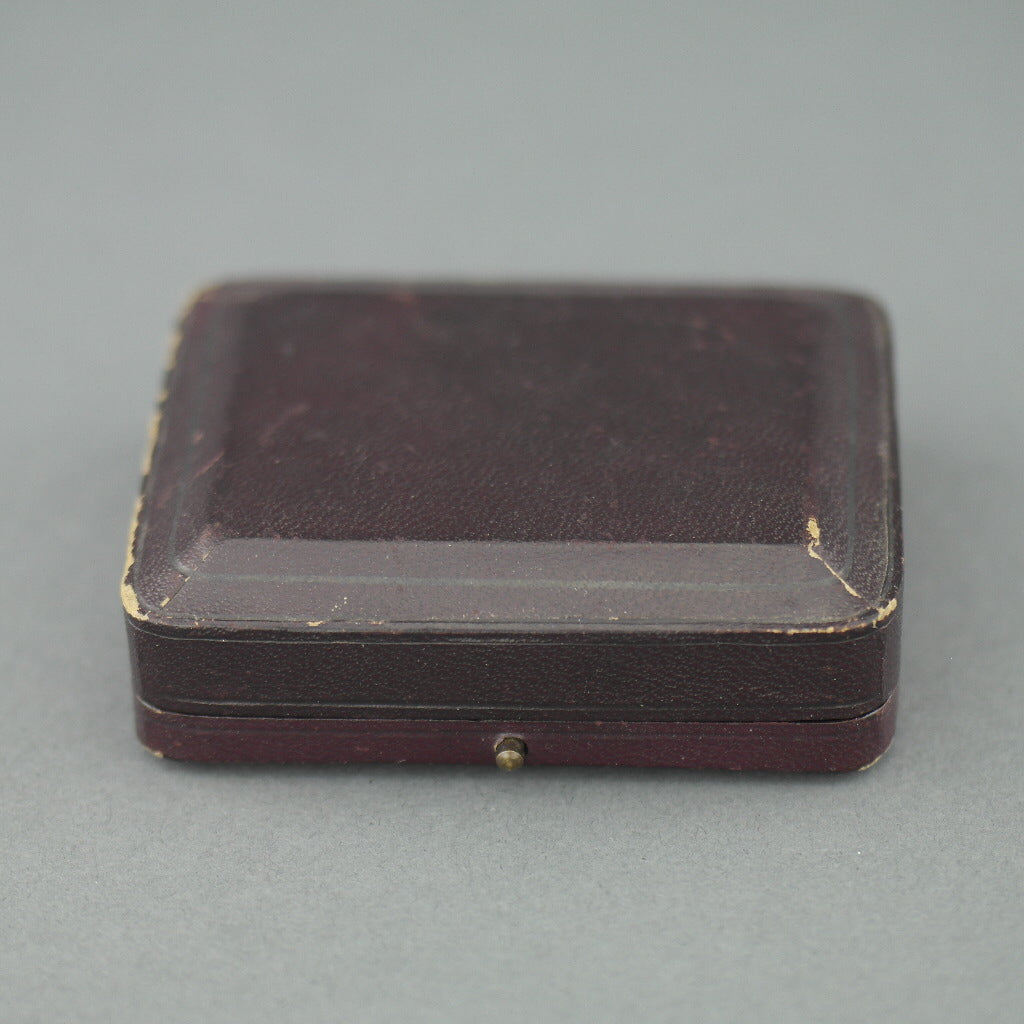 Caja de cuero antiguo marrón para juego de gemelos y tachuelas
