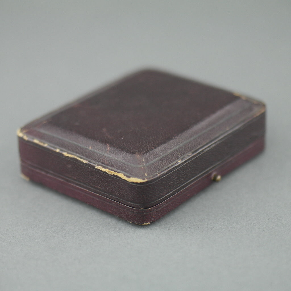 Caja de cuero antiguo marrón para juego de gemelos y tachuelas