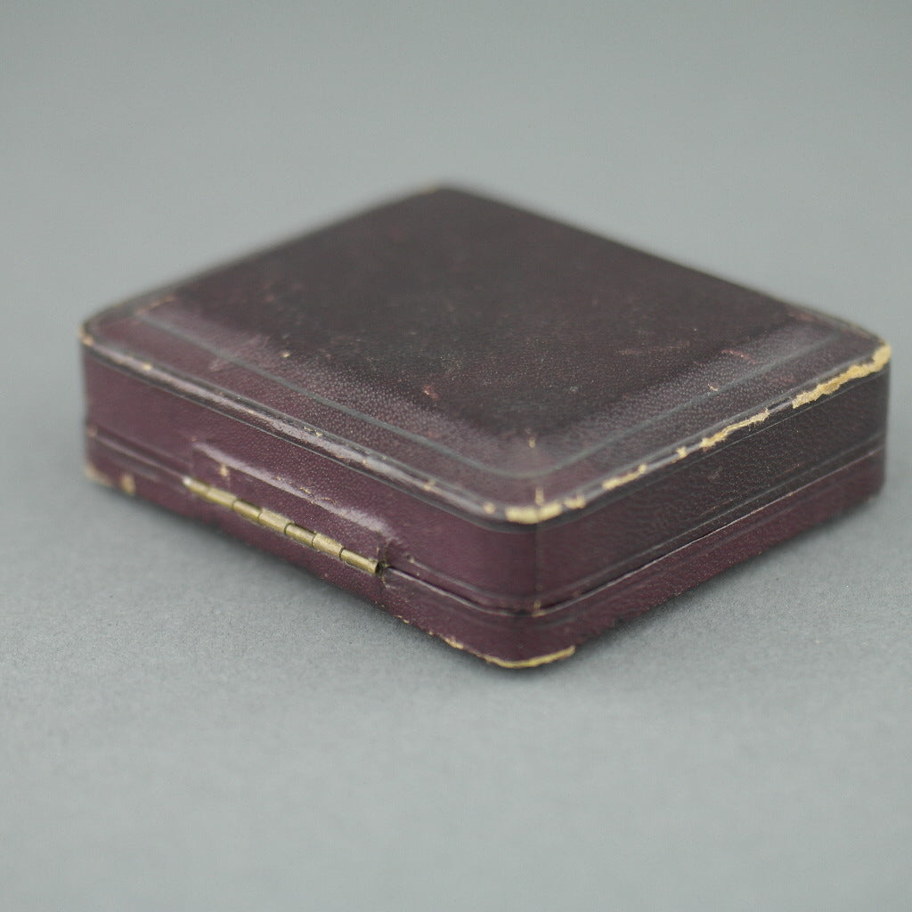 Caja de cuero antiguo marrón para juego de gemelos y tachuelas