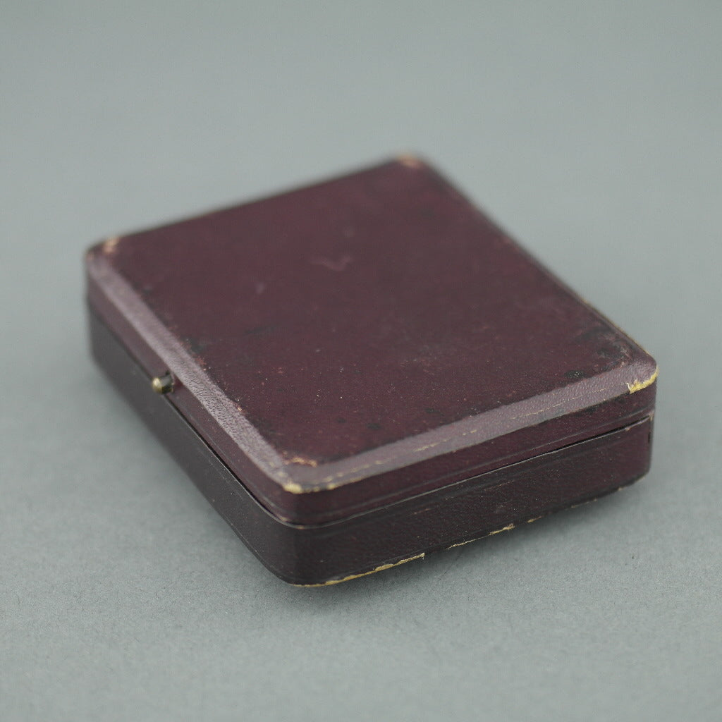 Caja de cuero antiguo marrón para juego de gemelos y tachuelas