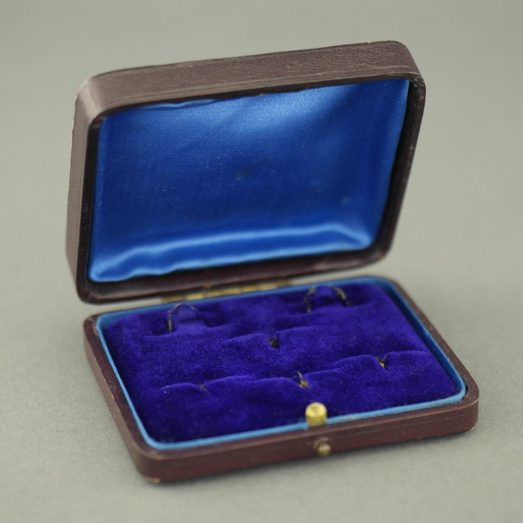 Caja de cuero antiguo marrón para juego de gemelos y tachuelas