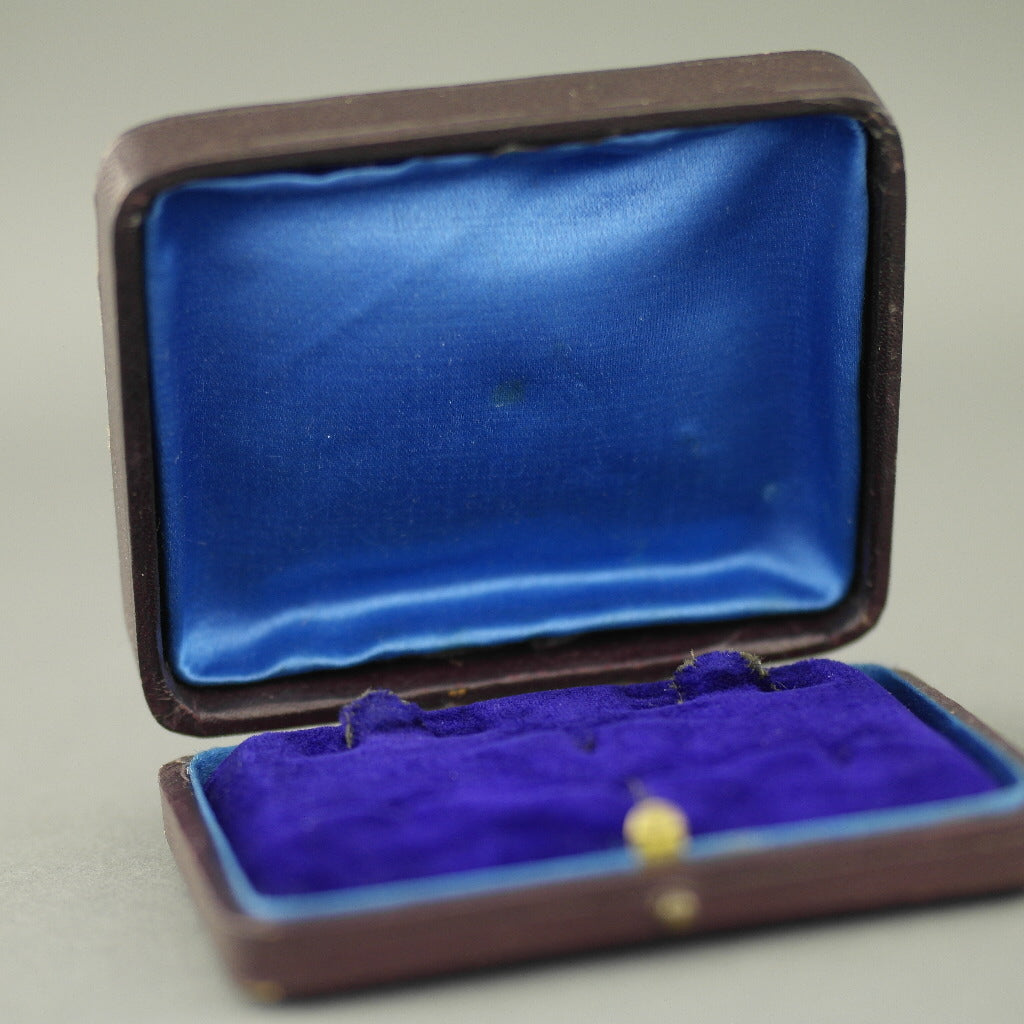 Caja de cuero antiguo marrón para juego de gemelos y tachuelas