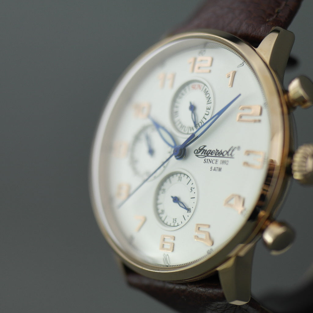 Ingersoll Eaton gold plated quartz wrist watch with Arabic numerals and leather strap