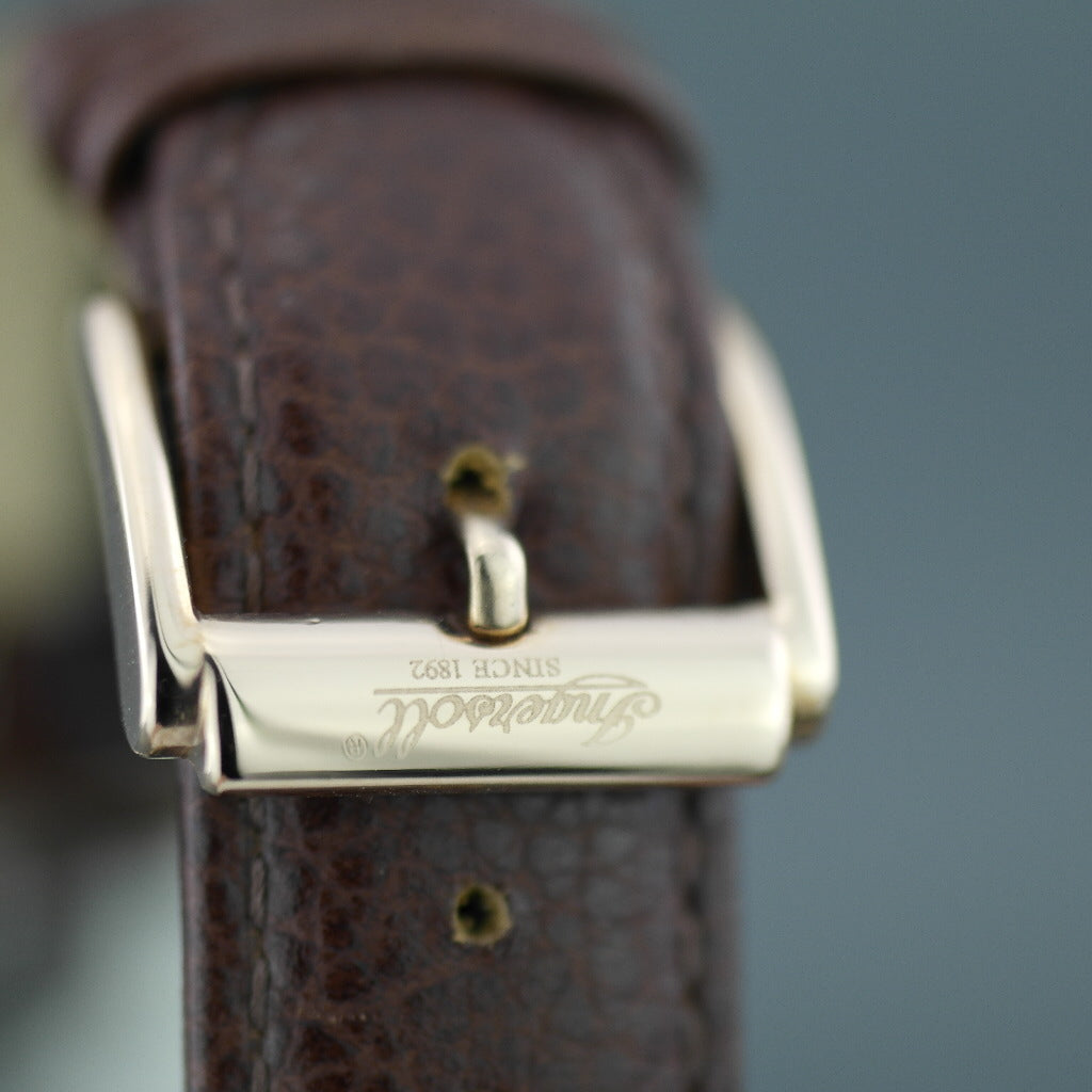 Ingersoll Eaton gold plated quartz wrist watch with Arabic numerals and leather strap