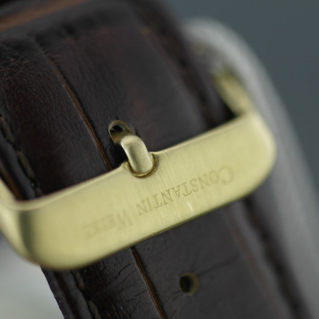 Automatische Herrenarmbanduhr von Constantin Weisz mit Mondphasen und verkrusteter Lünette