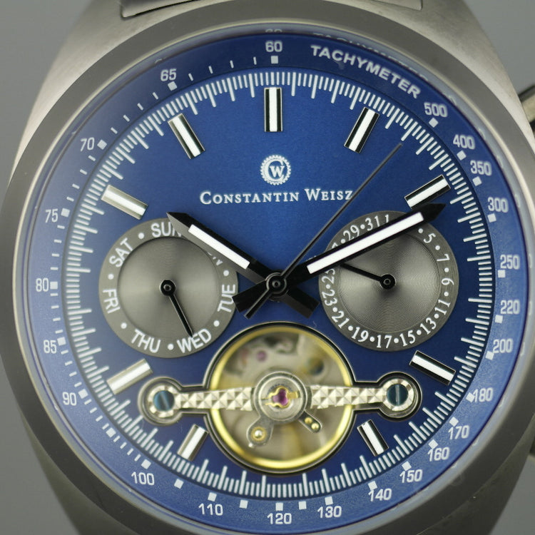 Constantin Weisz Herren-Armbanduhr mit automatischem Tachymeter und offenem Herzen