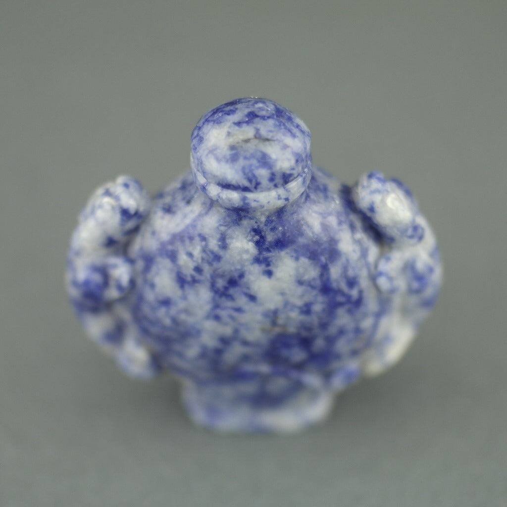 Impresionante botella de rapé de lapislázuli con leopardos