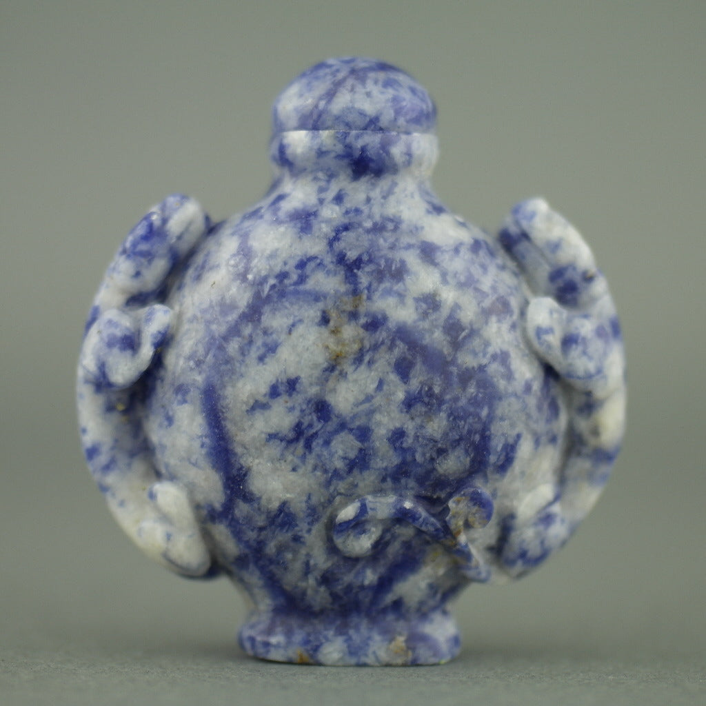 Impresionante botella de rapé de lapislázuli con leopardos