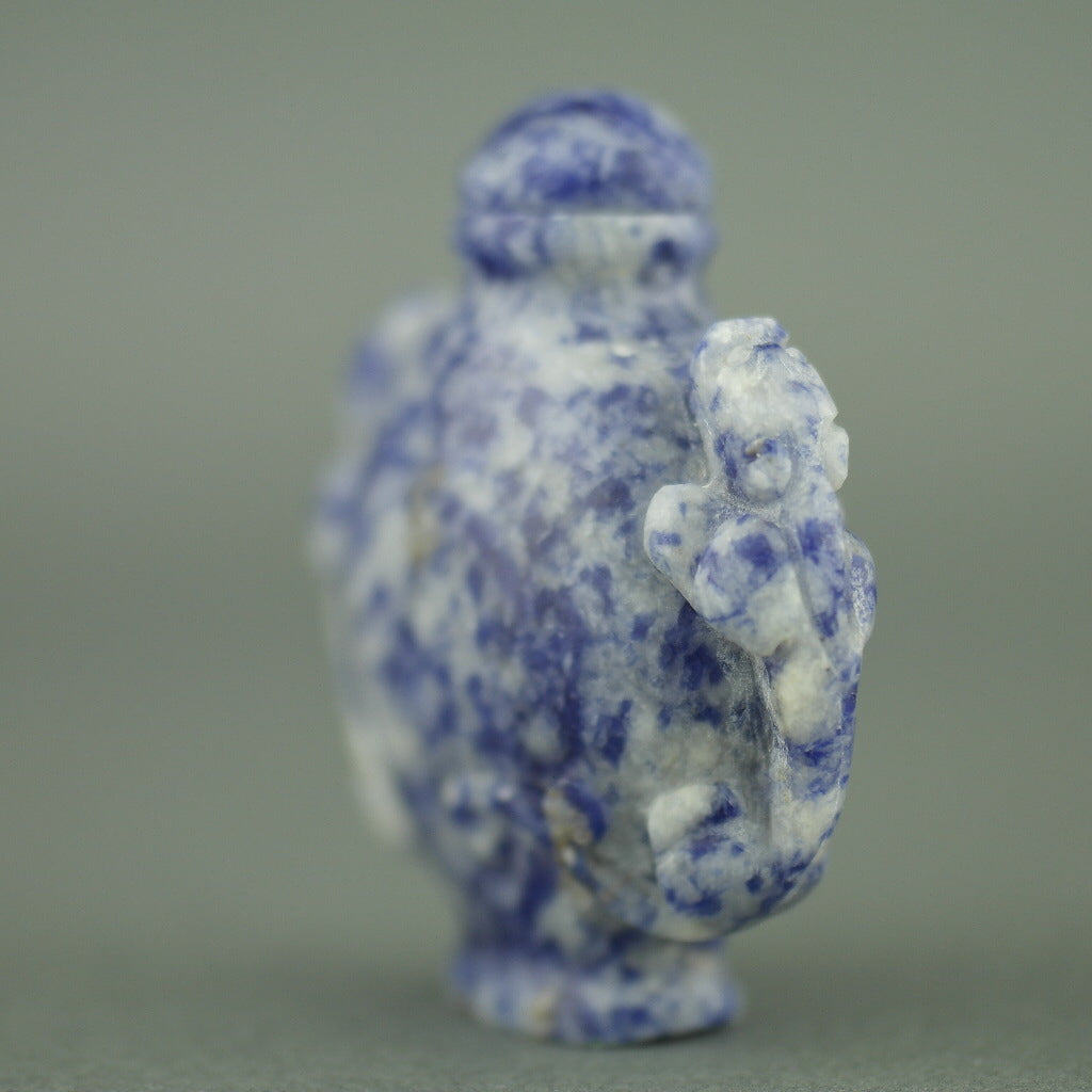 Impresionante botella de rapé de lapislázuli con leopardos