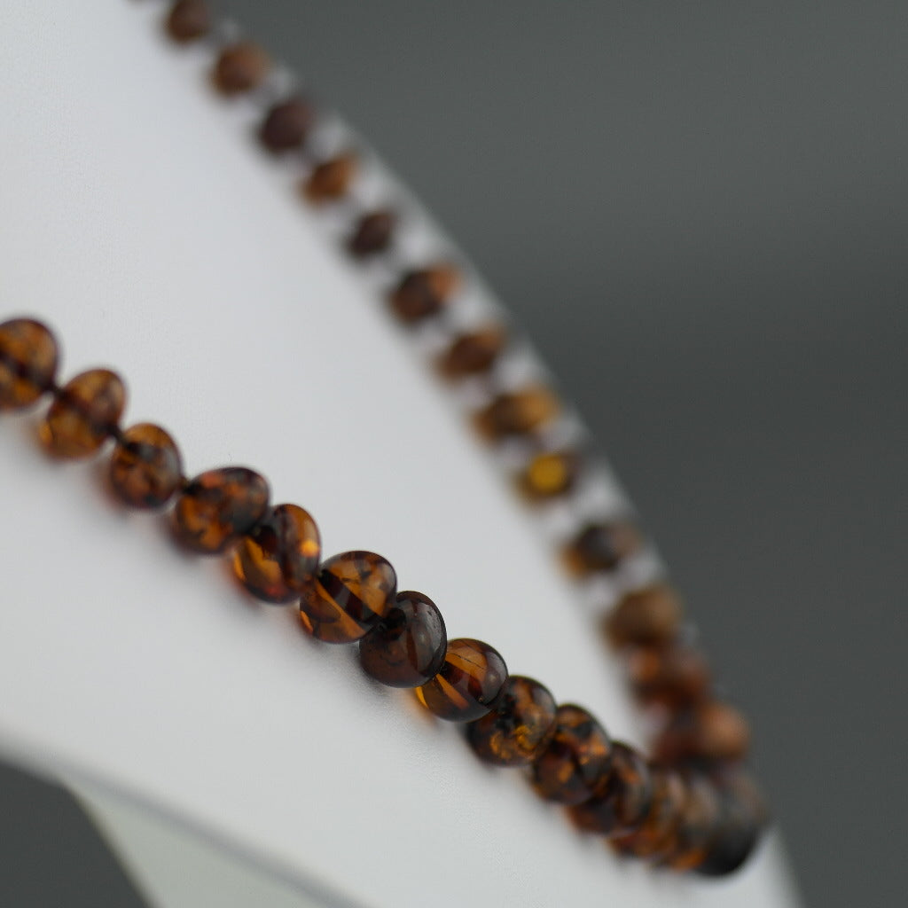 Natural shape Genuine Baltic Amber beads necklace dark cognac colour