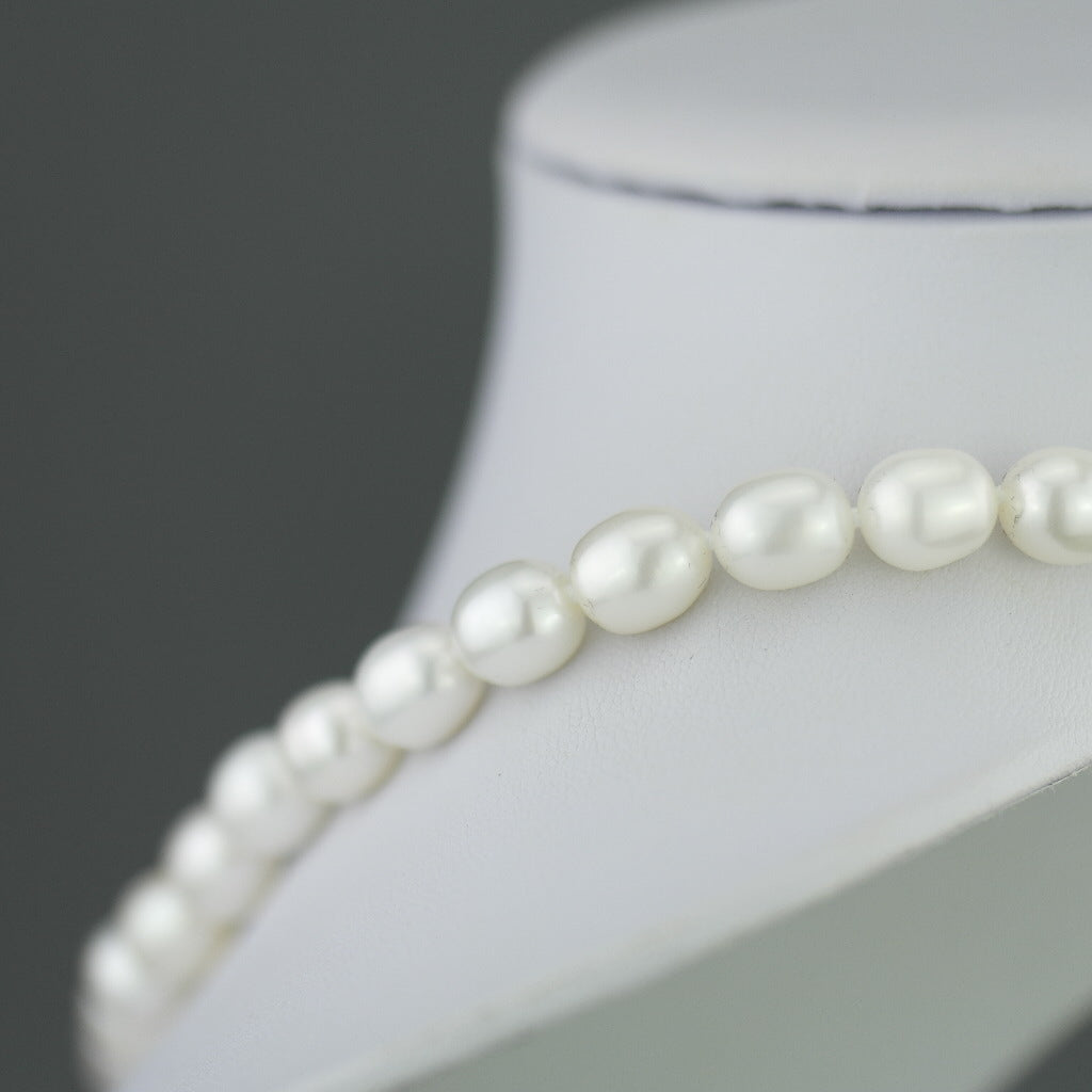 Collar Kyoto Pearls con cierre bicolor en oro de 9 quilates