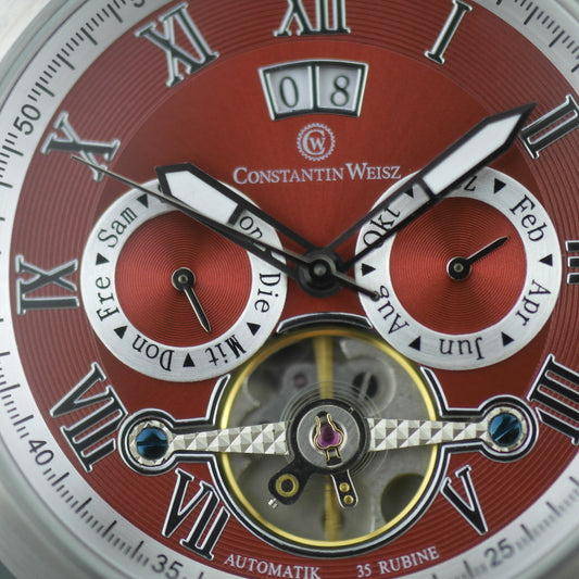 Constantin Weisz 35 Jewels Automatik-Armbanduhr mit offenem Herzen. Rotes Zifferblatt und Armband