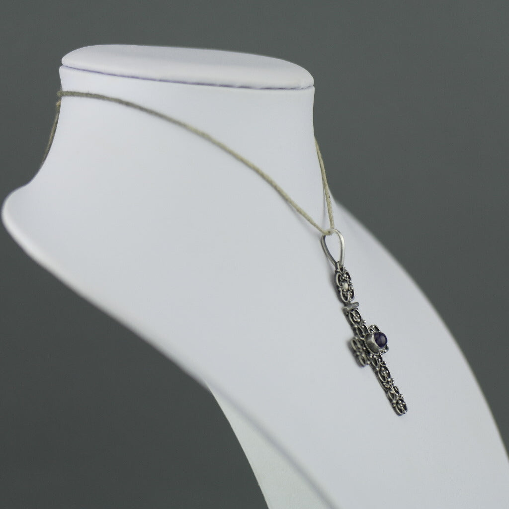Antique sterling silver cross pendant with Amethyst cabochon
