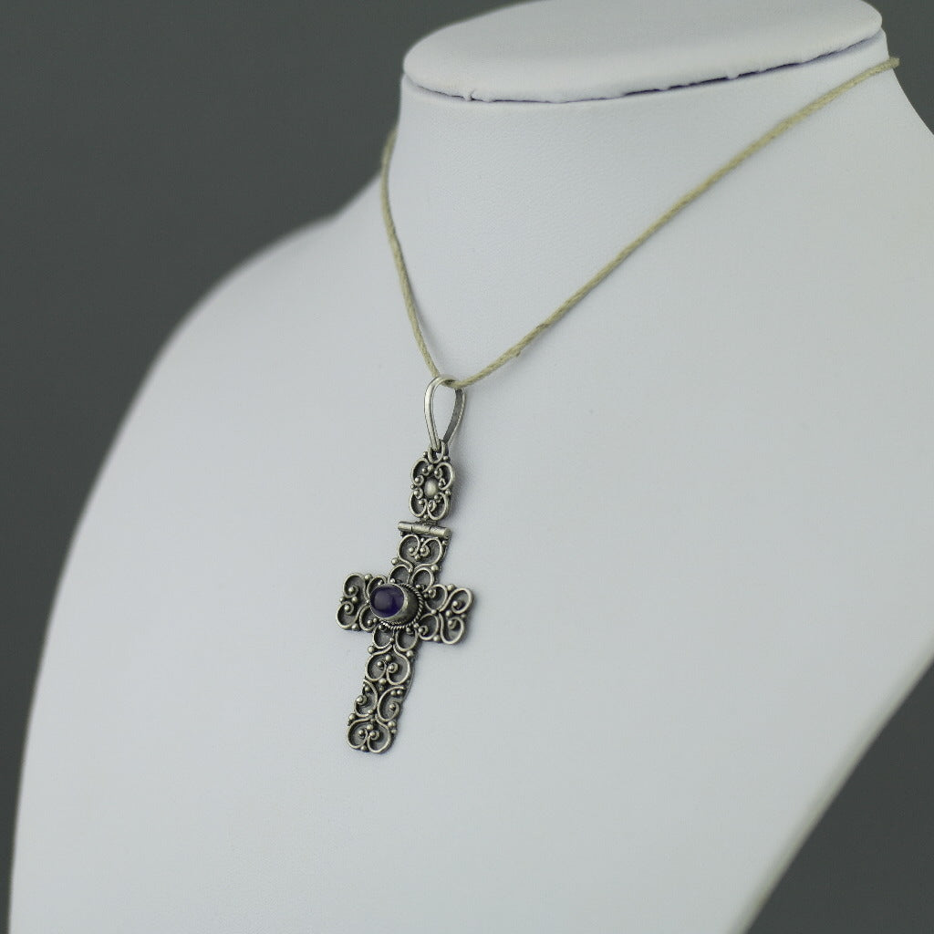 Antique sterling silver cross pendant with Amethyst cabochon