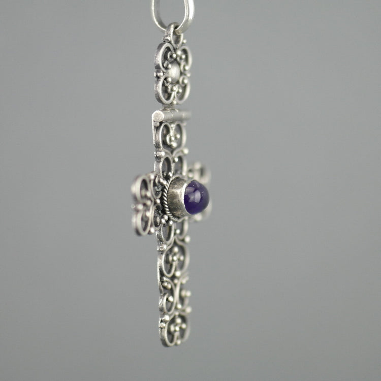 Antique sterling silver cross pendant with Amethyst cabochon