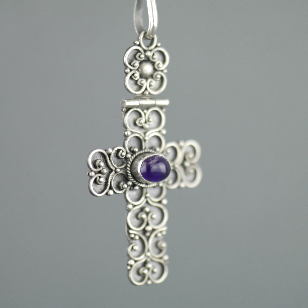 Antique sterling silver cross pendant with Amethyst cabochon