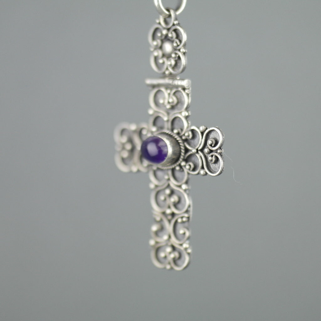 Antique sterling silver cross pendant with Amethyst cabochon
