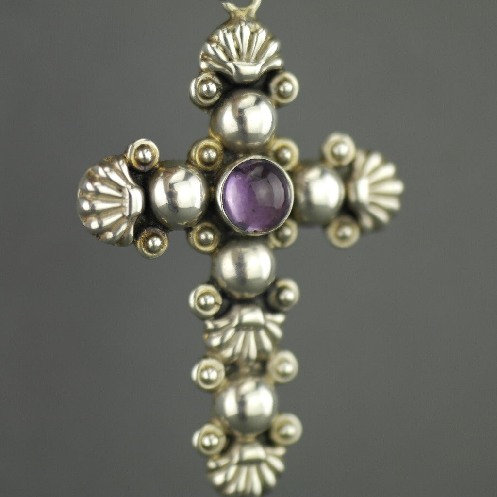 Vintage sterling silver cross pendant with amethyst cabochon stone