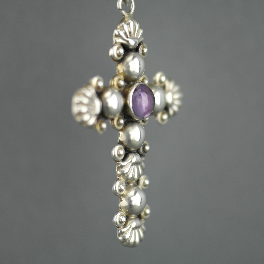 Vintage sterling silver cross pendant with amethyst cabochon stone