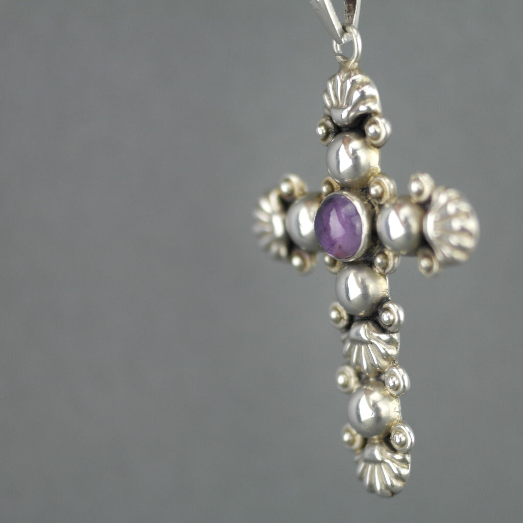 Vintage sterling silver cross pendant with amethyst cabochon stone