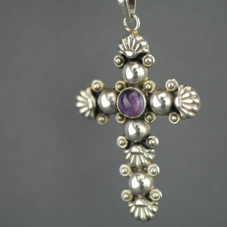 Vintage sterling silver cross pendant with amethyst cabochon stone