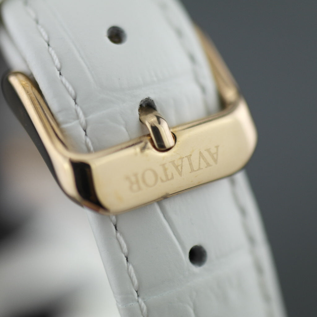 Reloj de pulsera Aviator chapado en oro con incrustaciones de Basilea y correas intercambiables.