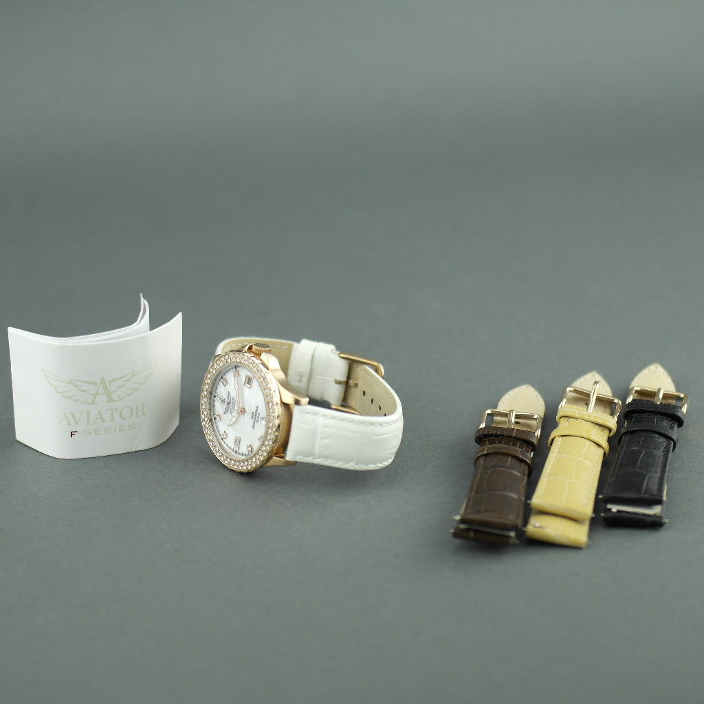 Reloj de pulsera Aviator chapado en oro con incrustaciones de Basilea y correas intercambiables.