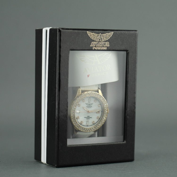 Aviator gold plated wrist watch with inlaid basel and interchangeable straps
