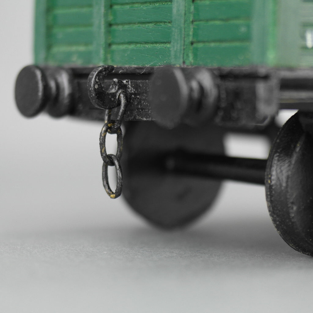 Vintage secret wooden box in shape of a train wagon full of coal