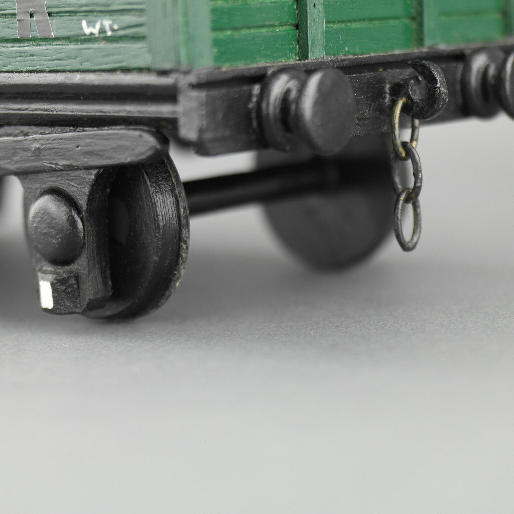 Vintage secret wooden box in shape of a train wagon full of coal