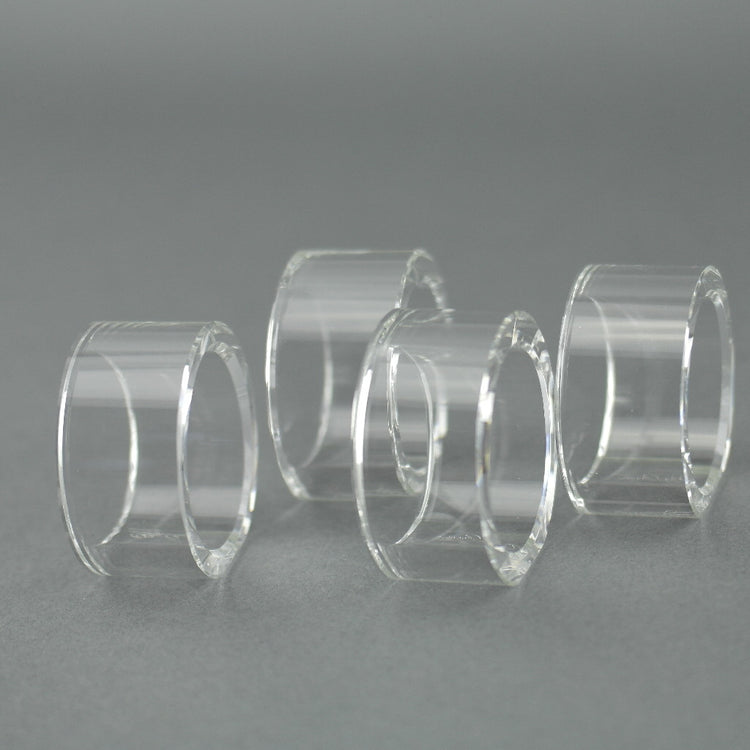 Oleg Cassini Juego de cuatro servilleteros de cristal con forma ovalada 