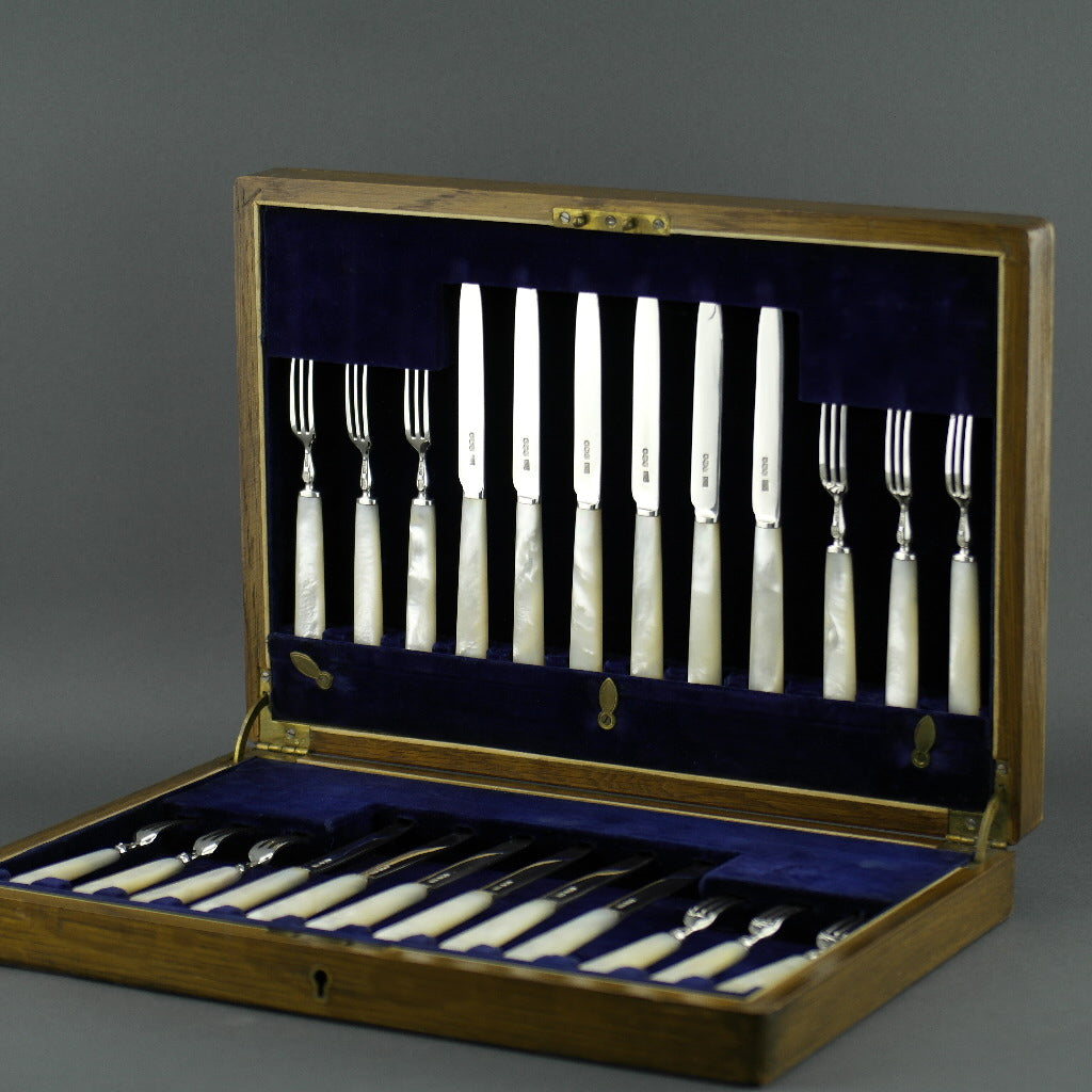 Antique 1925 Sheffield solid silver set of twelve forks and knives with Nacre handles