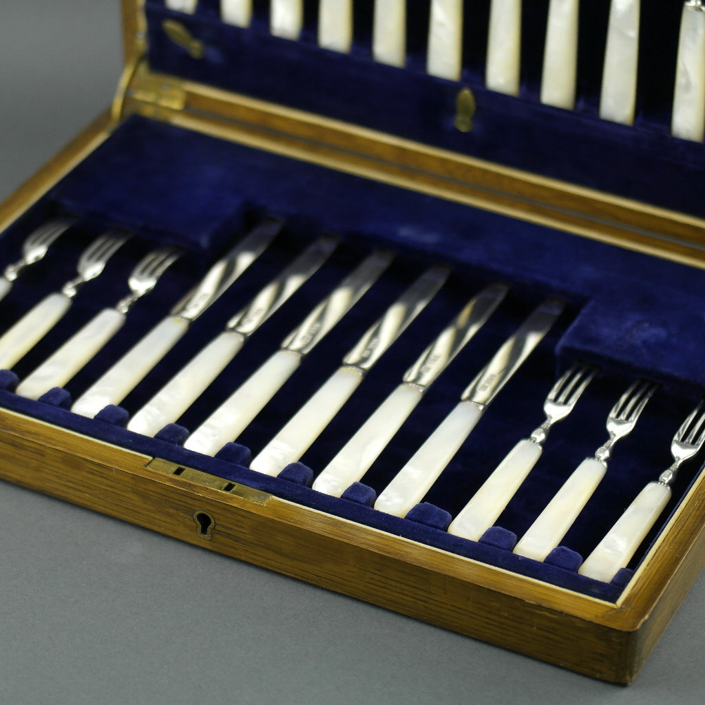 Antique 1925 Sheffield solid silver set of twelve forks and knives with Nacre handles