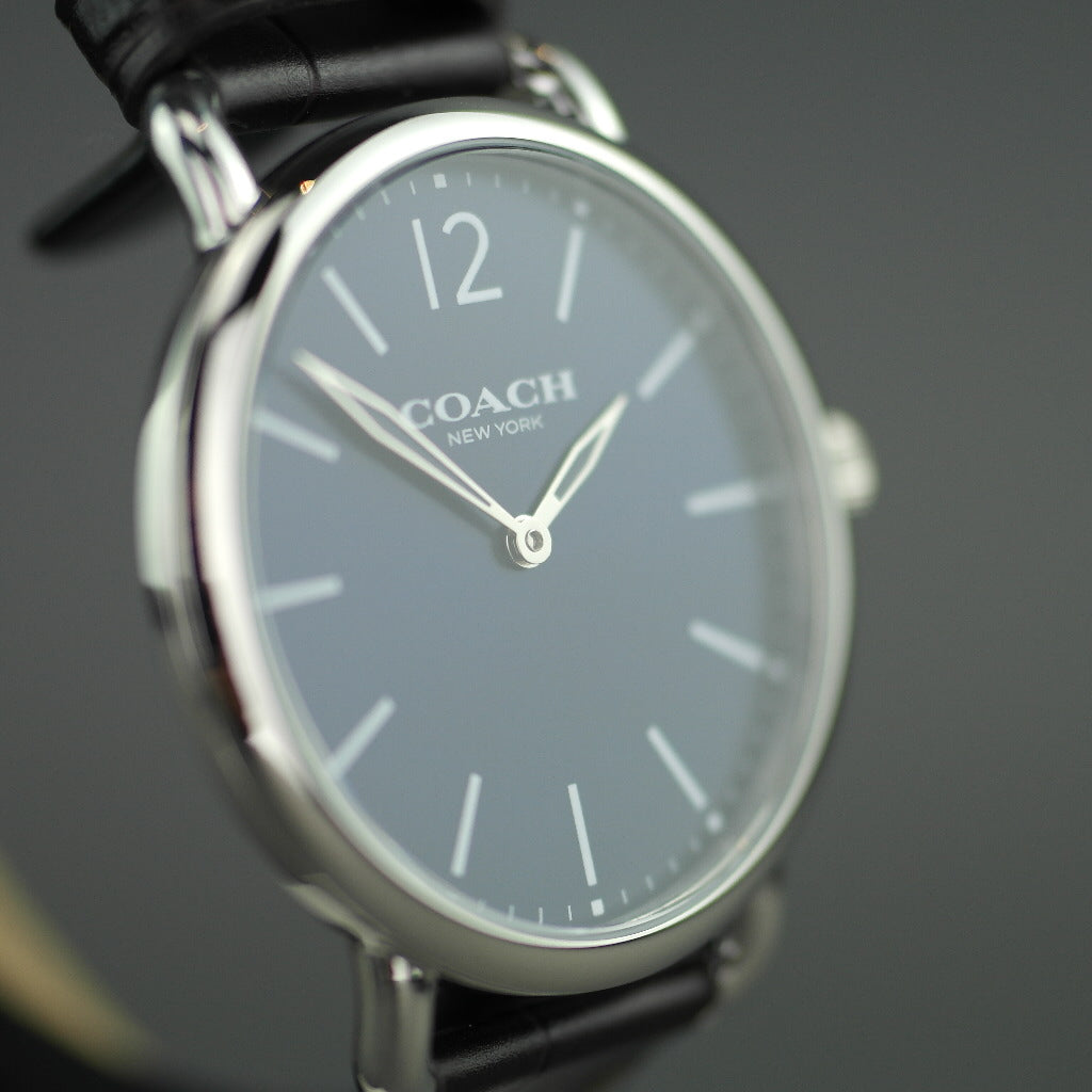 Reloj clásico Coach azul y marrón de la colección Delancey