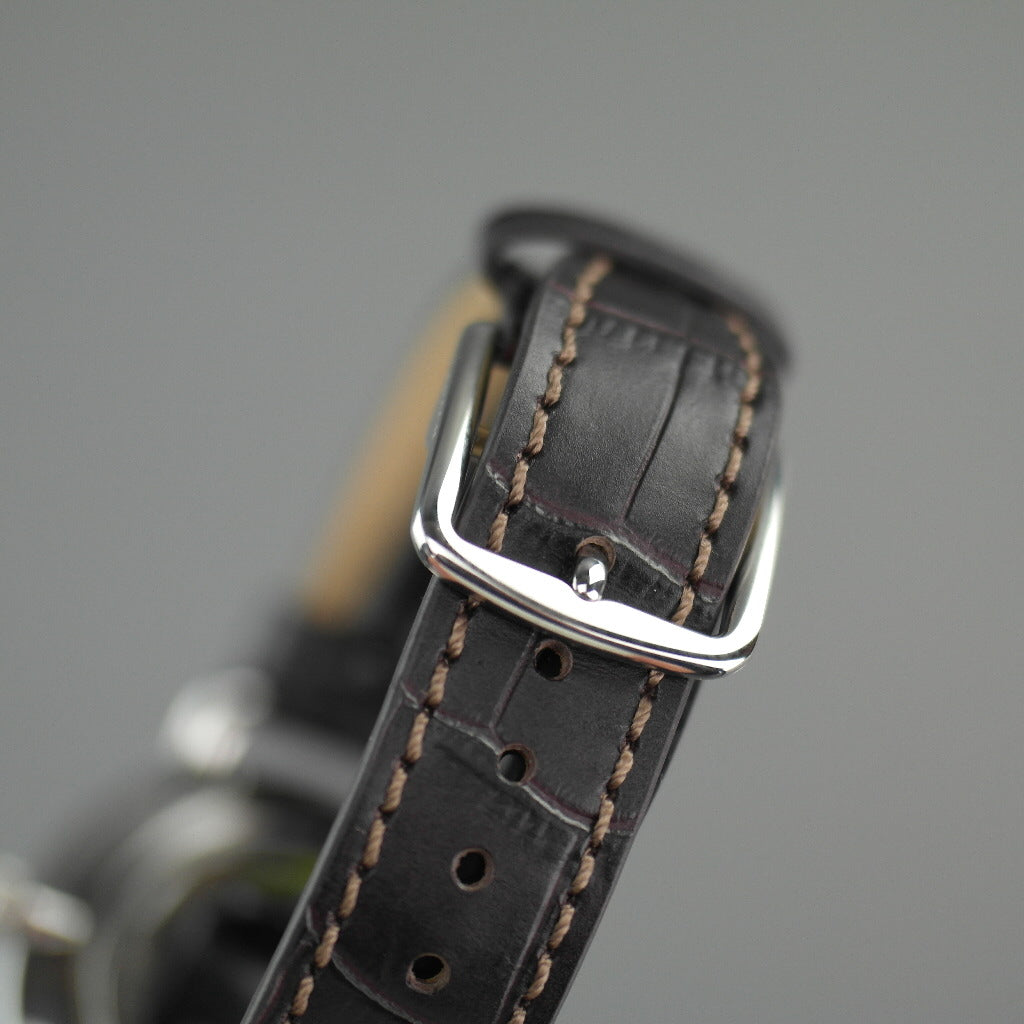 Reloj clásico Coach azul y marrón de la colección Delancey