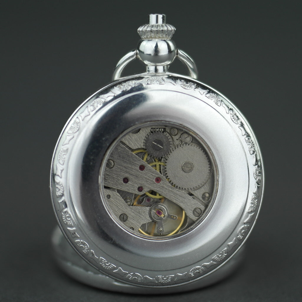 Silver plated pocket watch with Roman numbers and day and night indicator