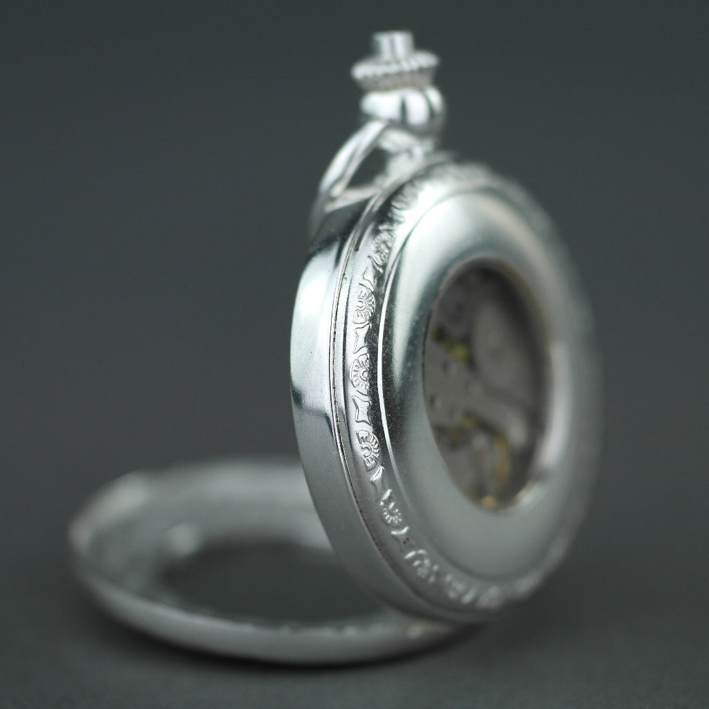 Silver plated pocket watch with Roman numbers and day and night indicator