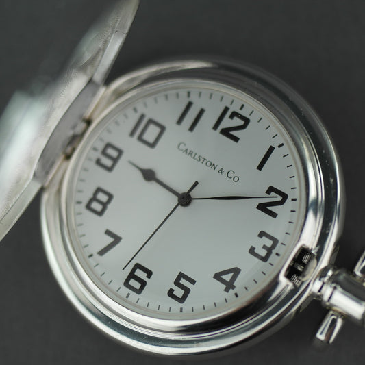 Carlston &amp; Co Full Hunter Reloj de bolsillo plateado con números arábigos
