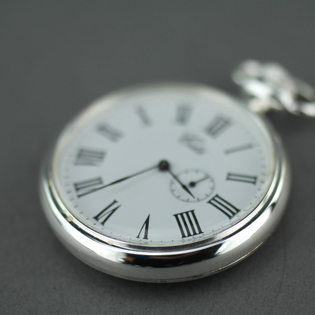 Cite open face Silver plated pocket watch with Roman numerals