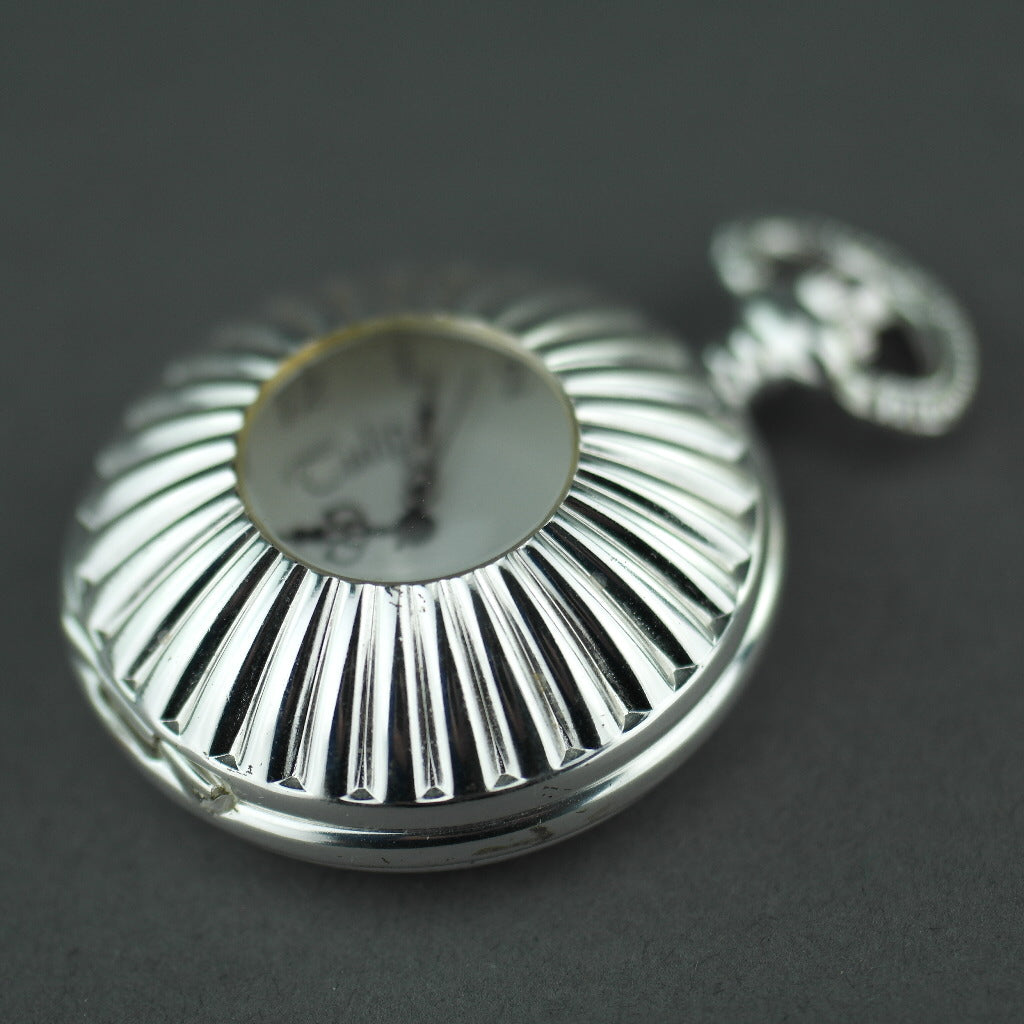 Tulip Half Hunter Silver plated pocket watch with Arabic numerals