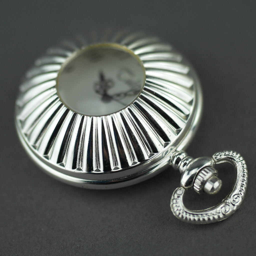 Tulip Half Hunter Silver plated pocket watch with Arabic numerals