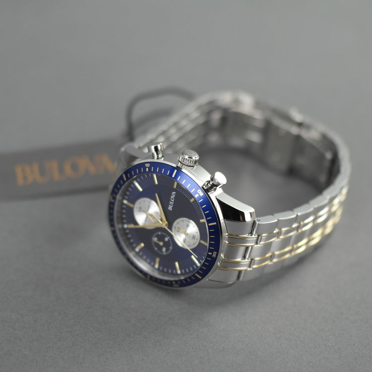 Reloj de pulsera deportivo Bulova para hombre con pulsera de acero inoxidable, elementos chapados en oro y esfera azul